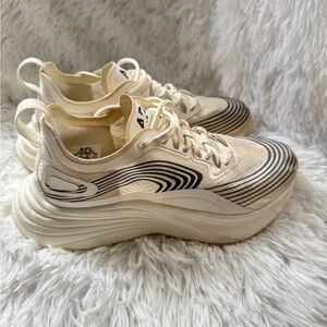 APL Cream and Black Athletic Sneakers